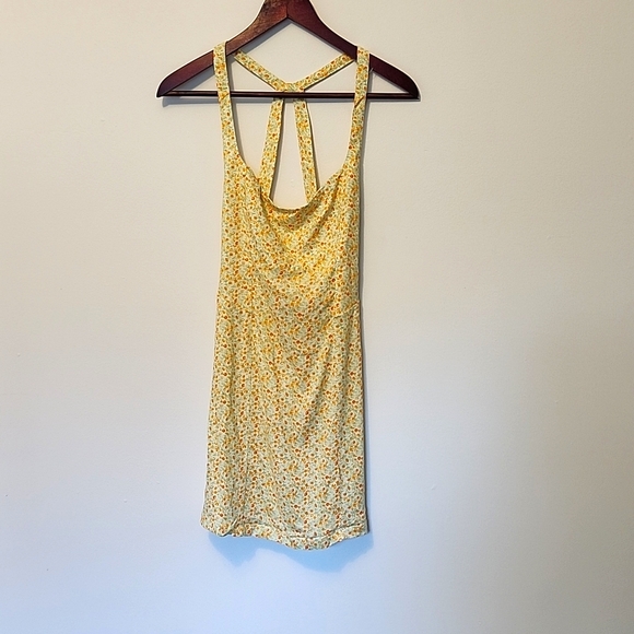 Free People Dresses & Skirts - Free people mini dress cream with oranges print open back cross straps size S